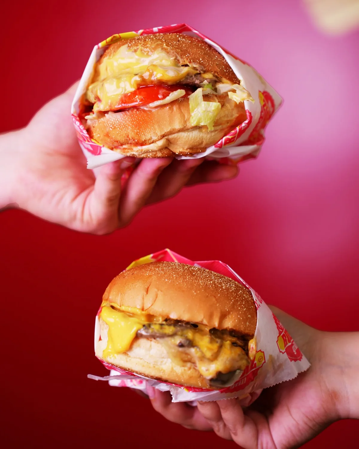 RUDIZ burger held in hand